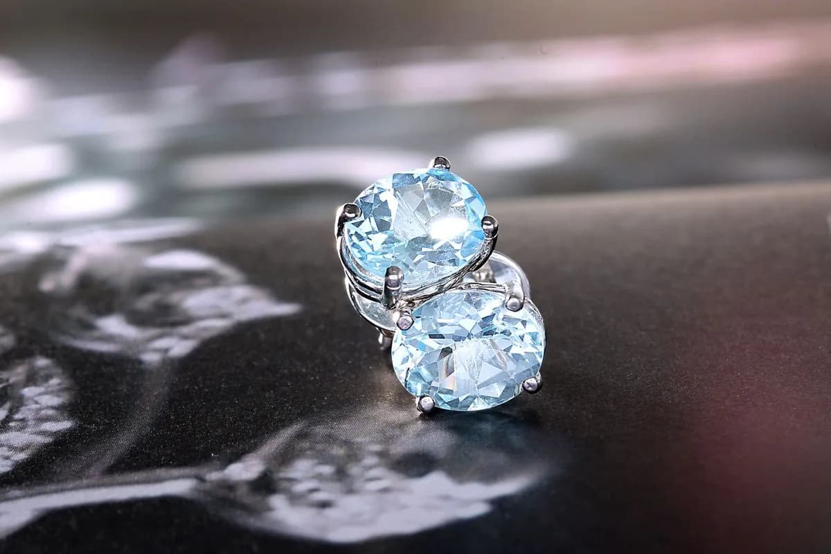 Oval aquamarine stud earrings in silver settings